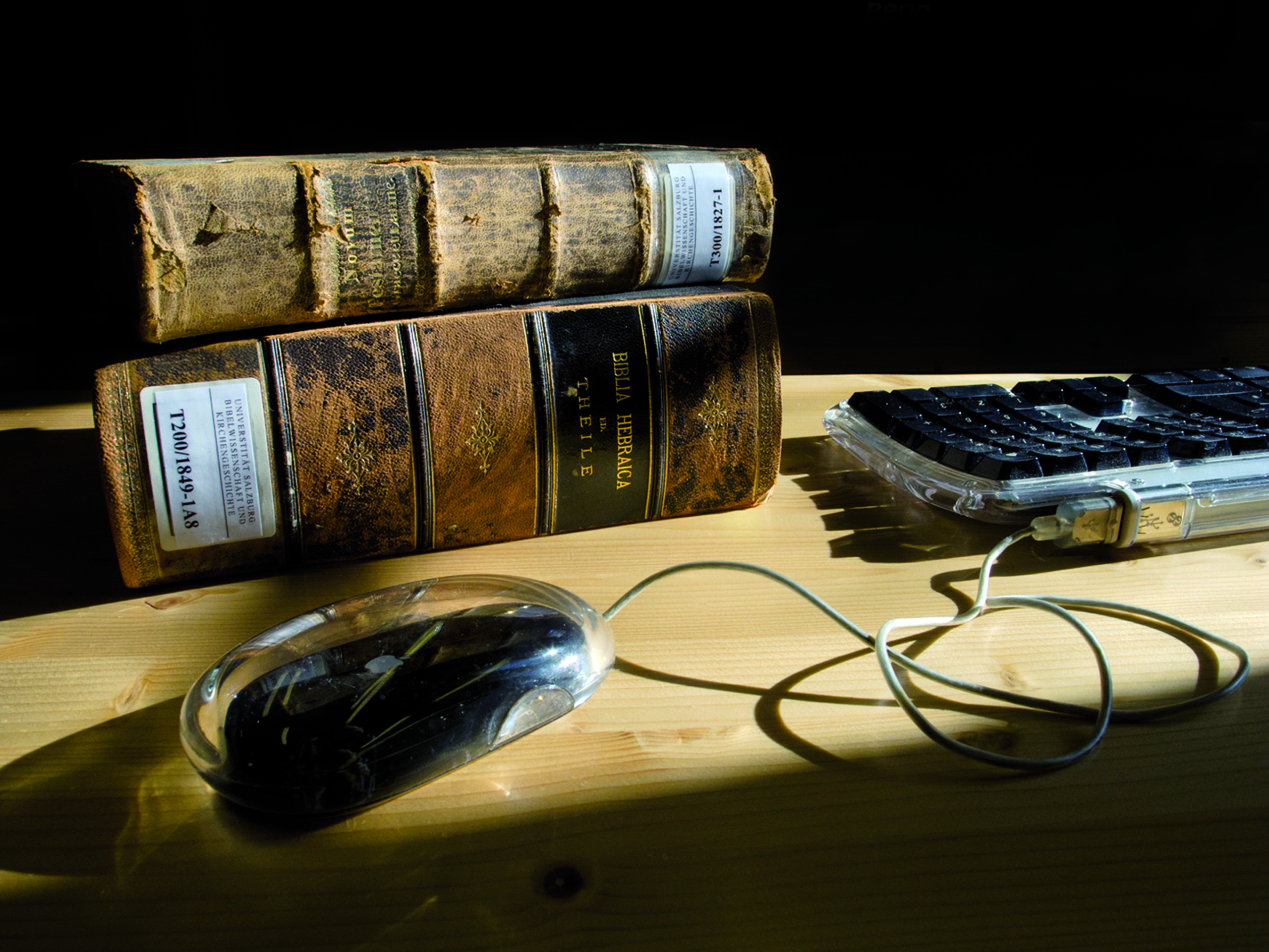 Photo: keyboard and old books