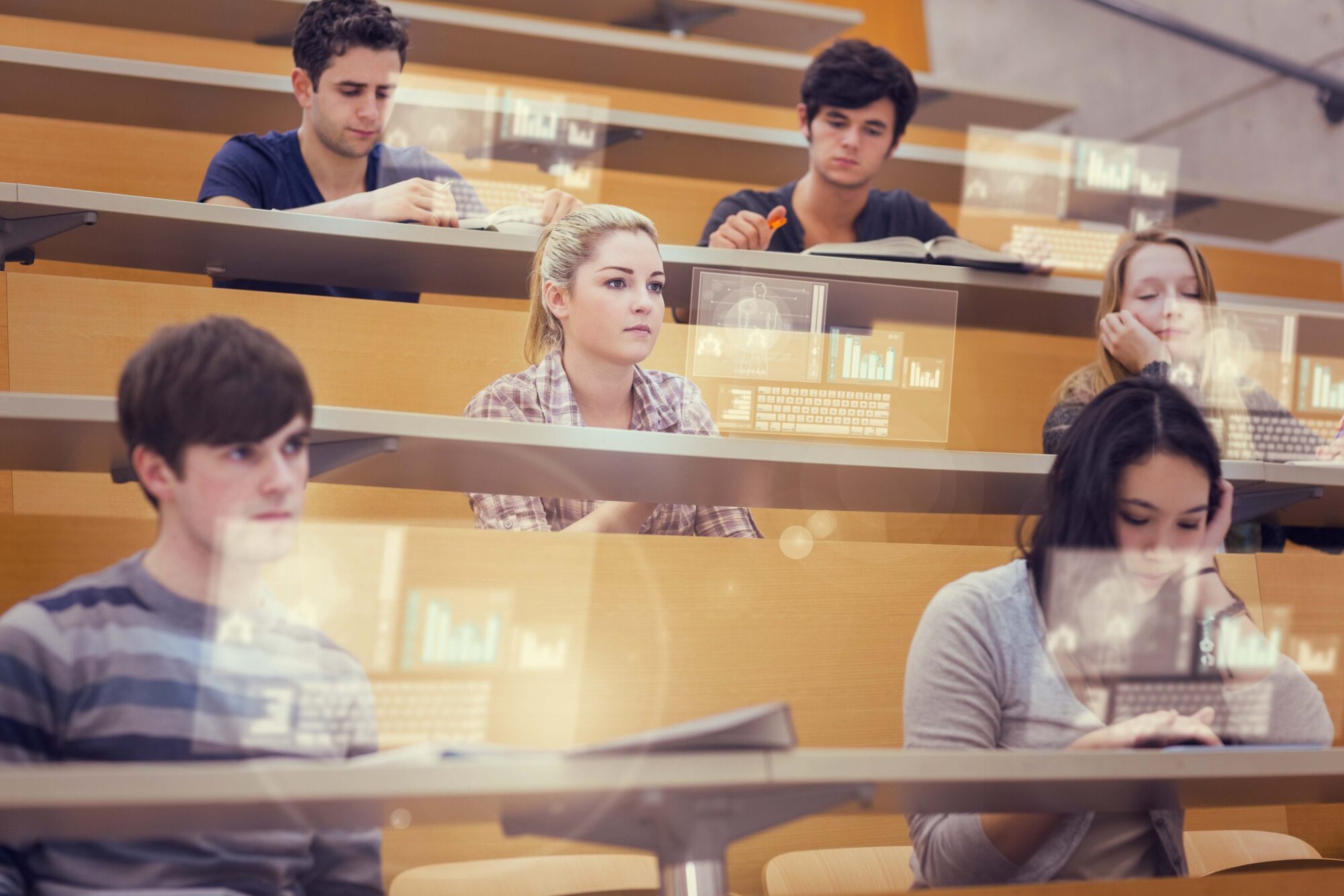 Concentrated students in lecture hall working on their futuristi