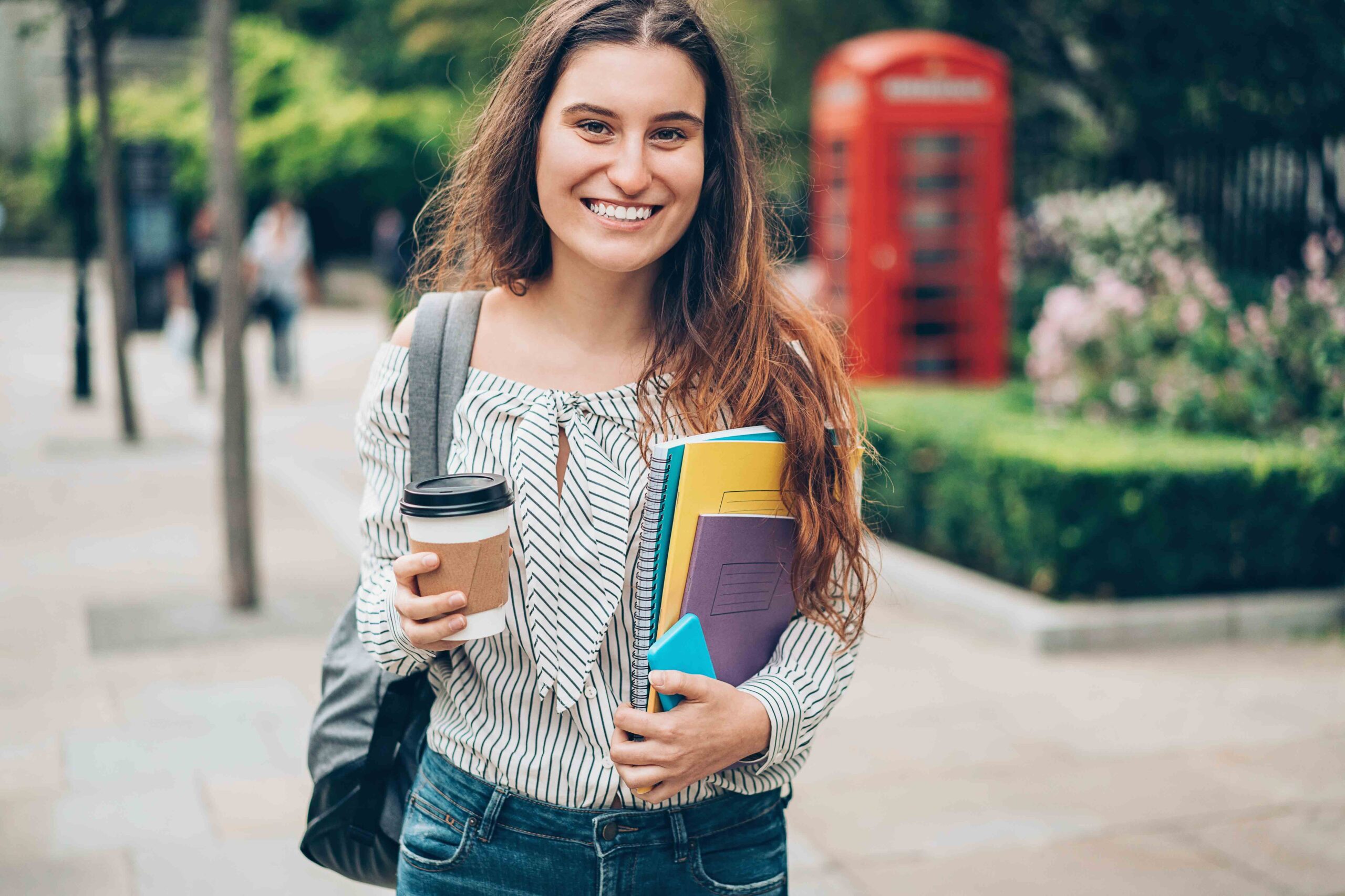 Smiling student walking outdoors