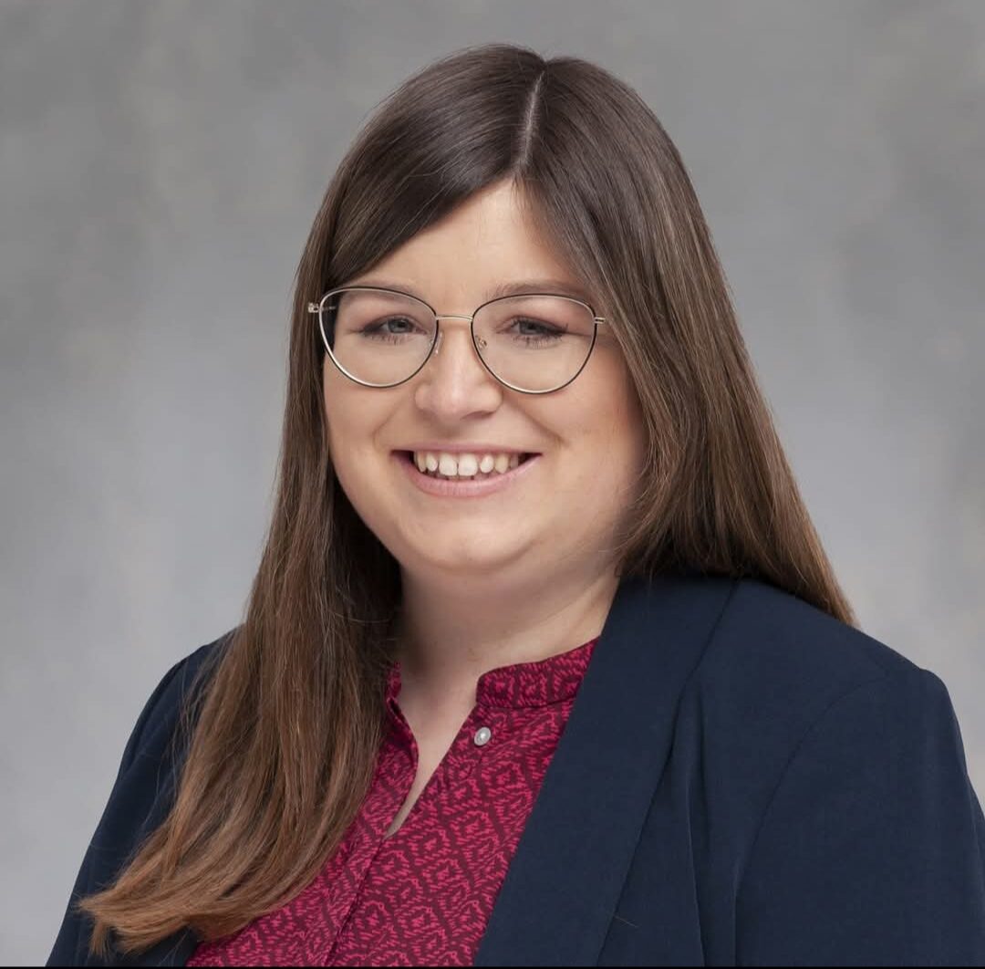 A professional portrait of Julia Kronreif