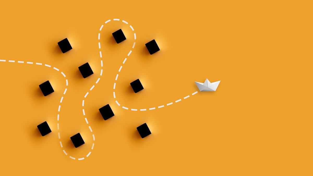 Papierschiff umschifft Barrieren