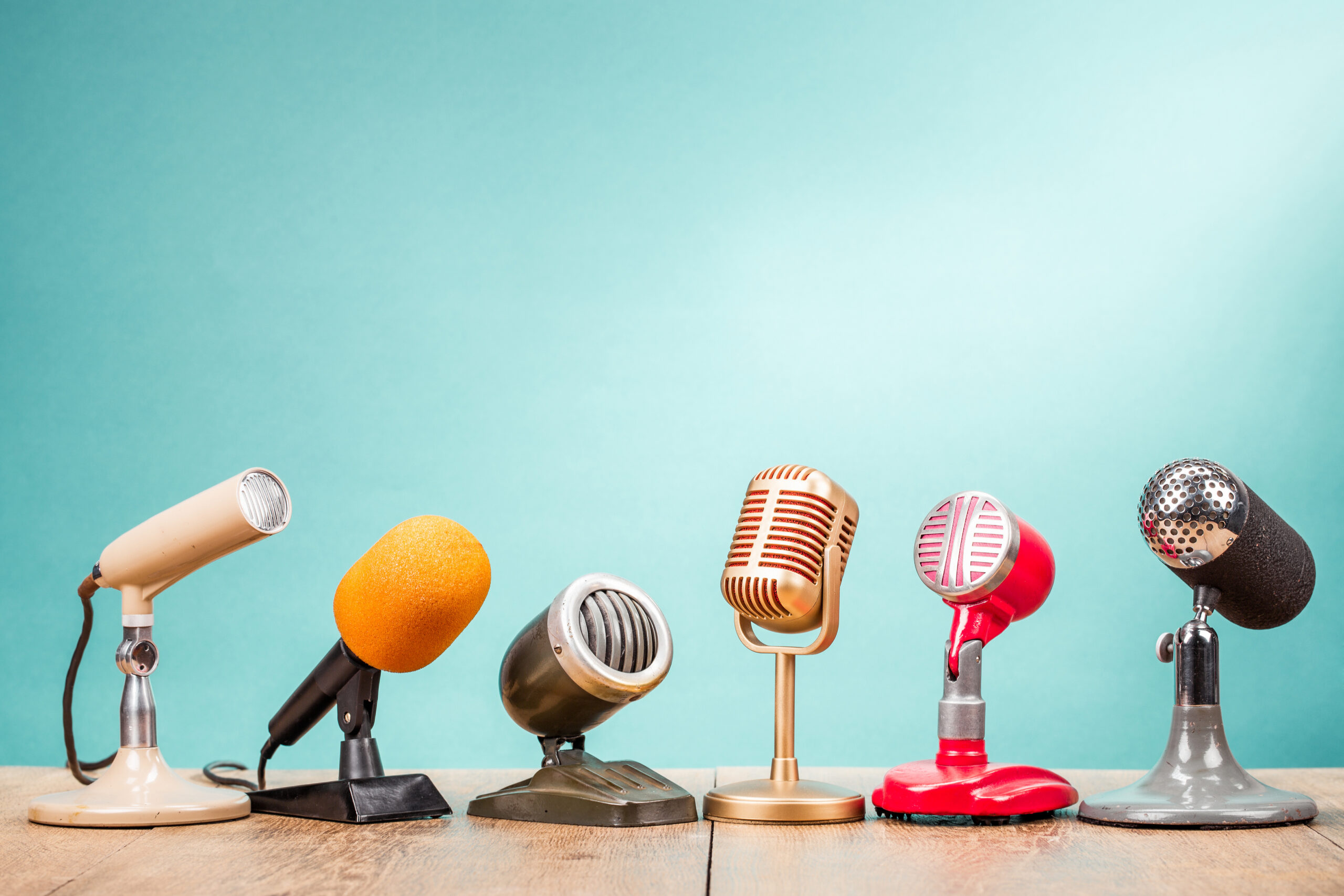 Retro old microphones for press conference or interview on table
