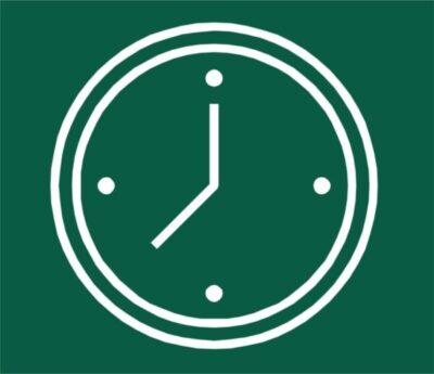White clock on green background