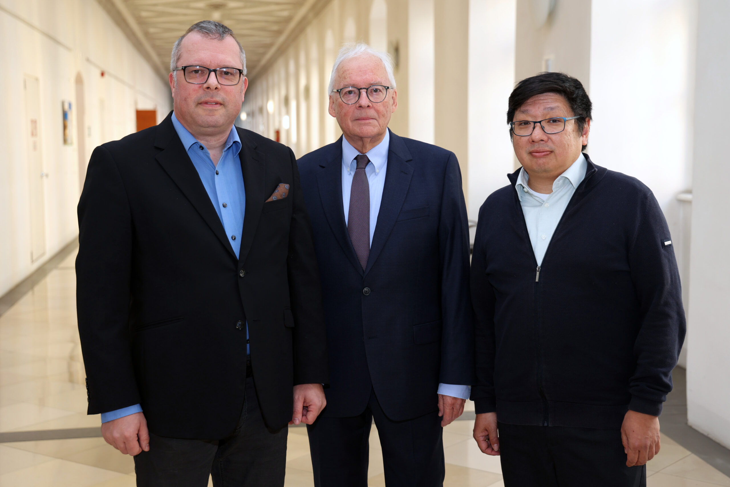 Gruppenfoto drei M&auml;nner. Ender, Pacik, Wang
